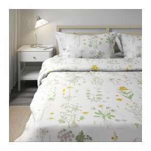 Bettwäsche mit gelbem Blumenmuster