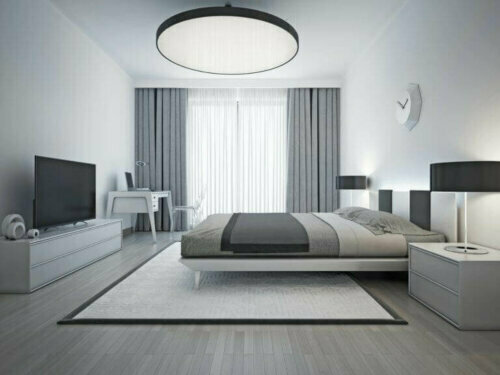 Für ein Schlafzimmer mit einer grauen Thematik kannst du mit verschiedenen Textilien und Texturen herumspielen, um dem Zimmer auf diese Weise mehr Wärme zu verleihen.