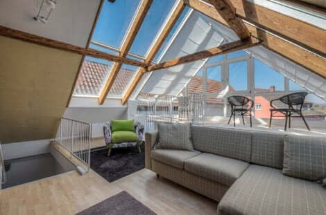 Das Wohnzimmer sollte sich in der Mitte der Dachgeschosswohnung befinden